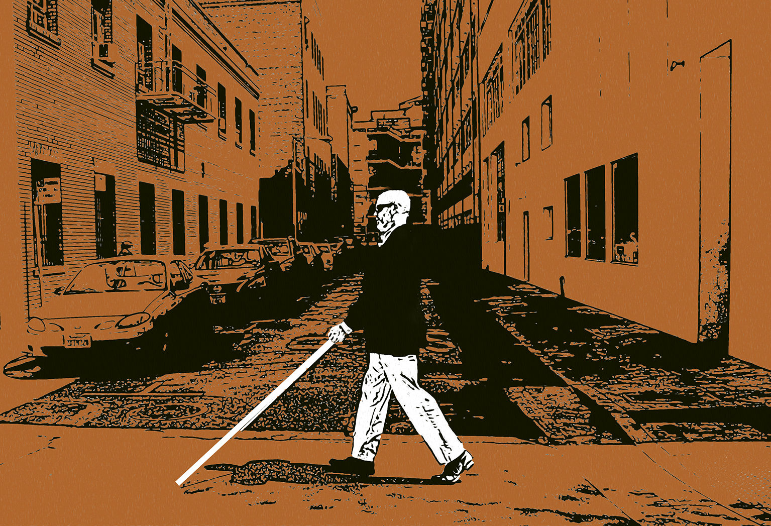Man walking down the street with a white cane