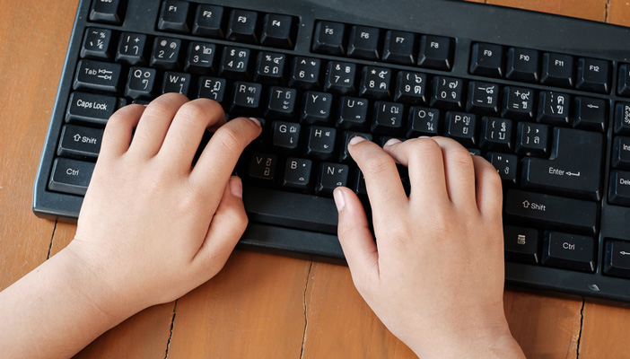 hands on a keyboard