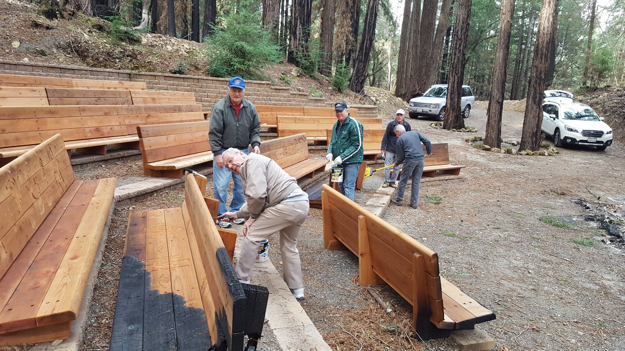 Our friends from the Napa Kiwanis Club put a protective coating on the benches in the Redwood Grove Theater to prevent rot. Some of the benches are charred, a reminder of the October fires in Napa.