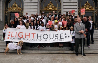 LightHouse celebrates White Cane Day on steps of San Francisco City Hall.