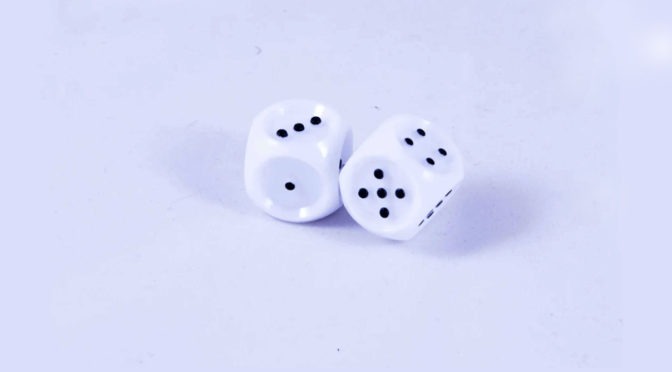 A pair of raised dot dice.