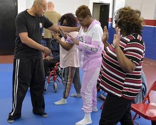 Personal safety instructor George Freeman leading a self-defense class