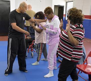 Personal safety instructor George Freeman leading a self-defense class
