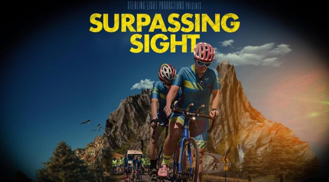 Surpassing Sight movie poster features two cyclists on a tandem bike leading a group of other cyclists on a paved road with mountains behind them
