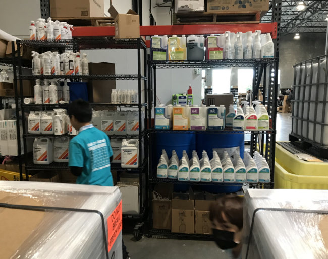 A student looks at cleaning products