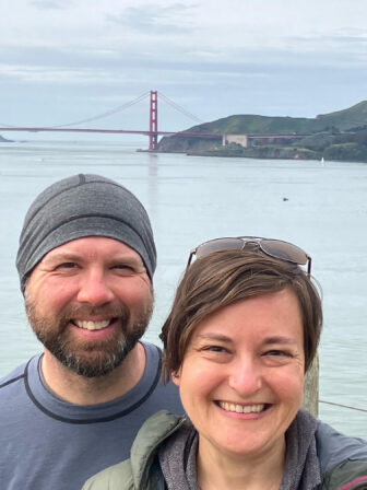 Patrick and Abbey pose together with a view of the Golden Gate Bridge in the background