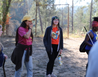LightHouse Youth and staff explore the redwoods of Enchanted Hills Camp at a previous Sensing the Seasons