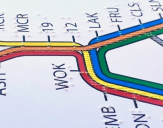 Finger on tactile BART system map.