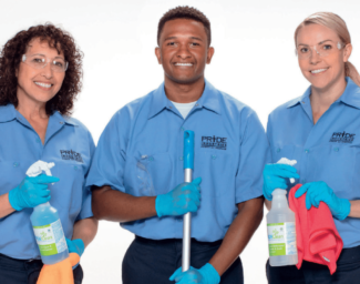 Three people wearing Pride Industries uniforms. The middle one holds the handle of a mope when the two at either end hold PrideClean products