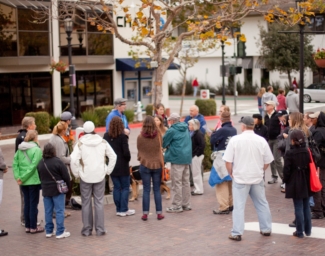 A group of people each using various alternative tools, and techniques to independently navigate their environment.