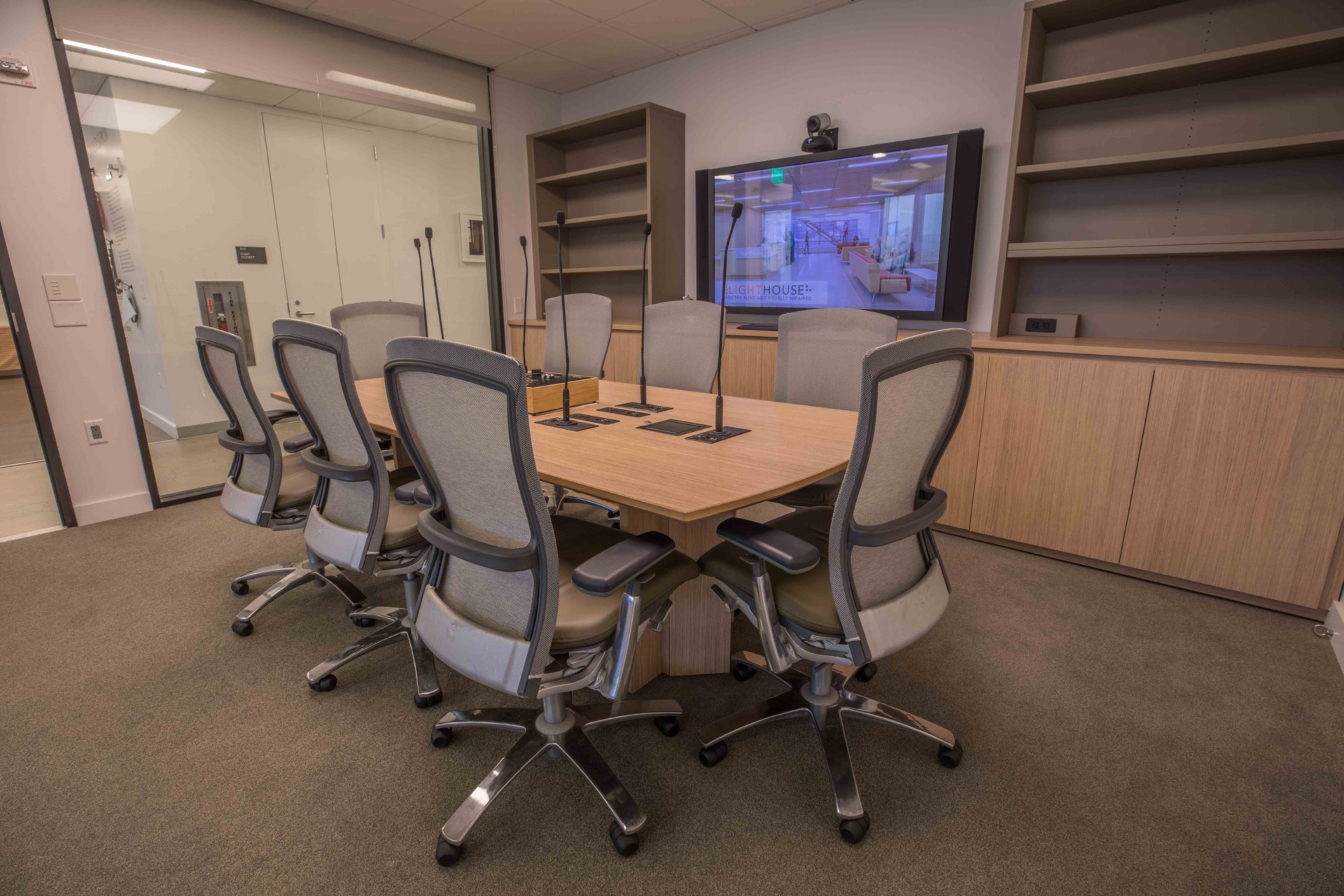 8-person conference room outfitted with AV.