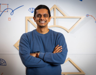 Creator of Lumin, Sriram Ganesh, poses with his arms crossed