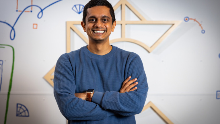 Creator of Lumin, Sriram Ganesh, poses with his arms crossed