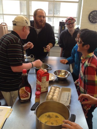 Jamey Gump teaches during Youth Cooking Class