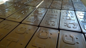 Bars of Enchanted Hills chocolate - visible are the raised letters that spell out EHC