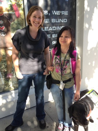 LightHouse Orientation & Mobility Specialist Katt Jones stands next to UC Berkeley student Tiffany Zhao and her dog guide Helene during our April LightHouse Connect workshop on travel. Tiffany came to the workshop to share her experience as a dog guide user