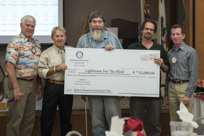 Rotary Club of Napa members present a giant-sized check for $32,000 to Enchanted Hills staff. Left to right, Dale Carriker, Gary Rose, Camp Construction Manager George Wurtzel, Camp Director Tony Fletcher and Tim Cooney