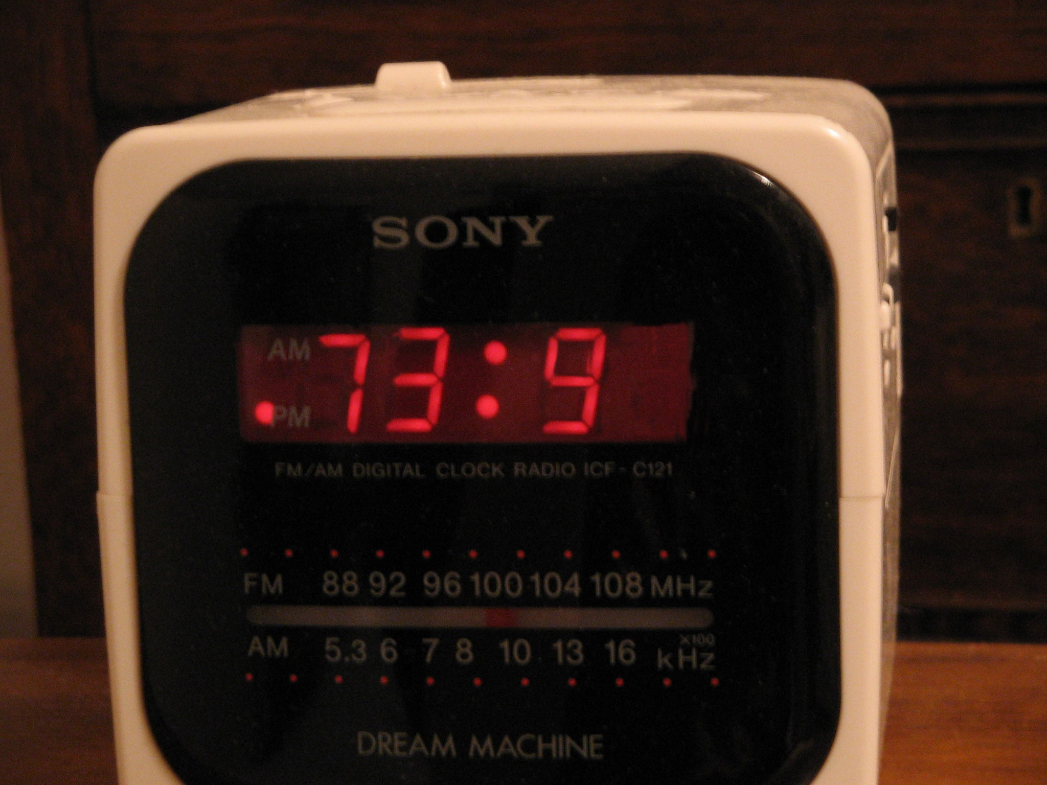 Image: A clock radio reading 73:9